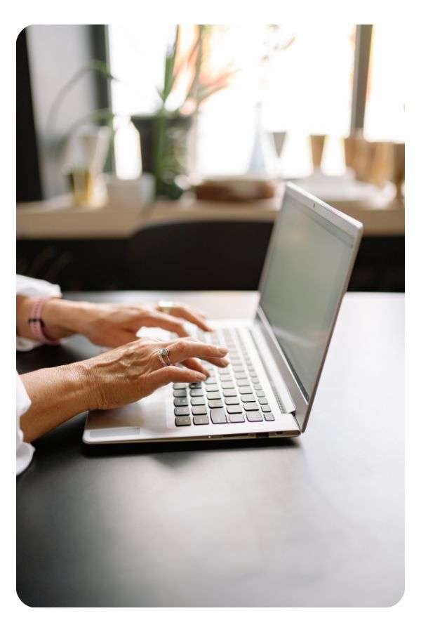 Person typing on a laptop